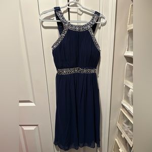 Very pretty, dark blue dress with sequins.
